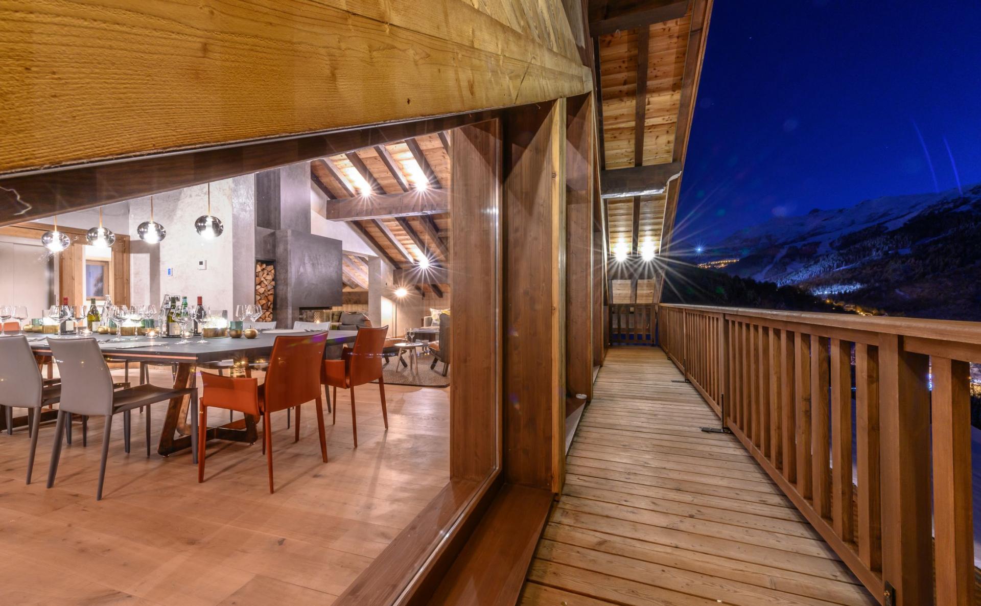 Dining room and balcony at night